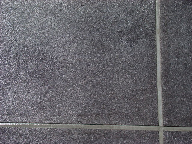 coloured concrete with grout lines
